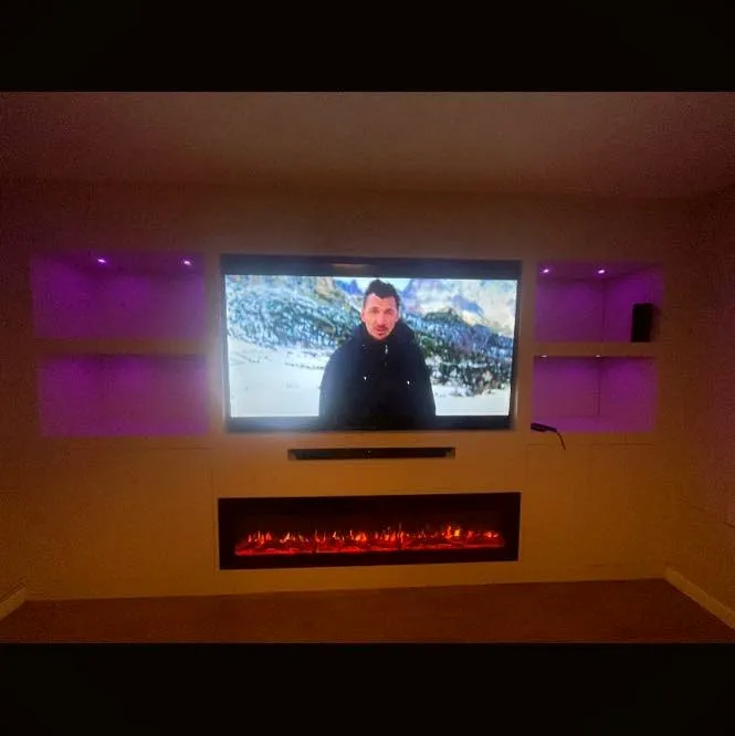 Lit media wall in oak and navy, finished install